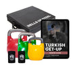 Introducing the vibrant Wildman Turkish Get Up Kettlebell Bundle by Bells of Steel, featuring red, green, and yellow kettlebells with black wrist wraps. Enhance your routine with Mark Wildman's master class on your iPad, all in chic black boxes.