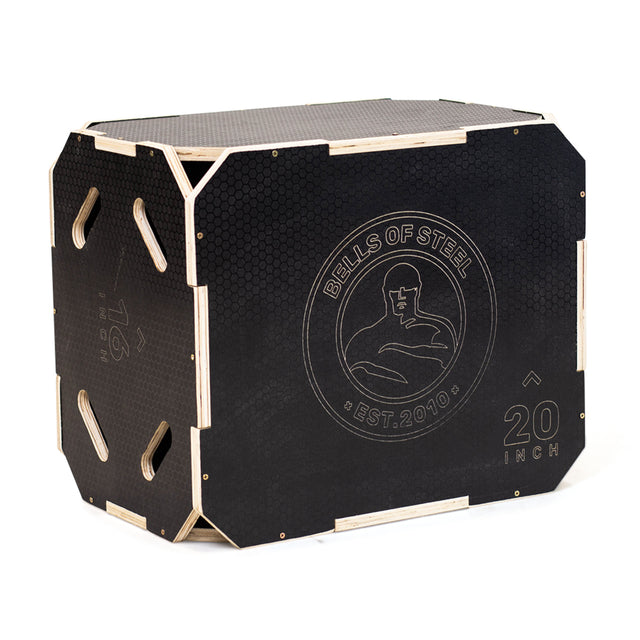 The Bells of Steel 3 in 1 Anti-Slip Wood Plyo Box is black and rectangular with wooden edges, ventilation slots for grip, and "20 inch" height marking—ideal for any home gym.