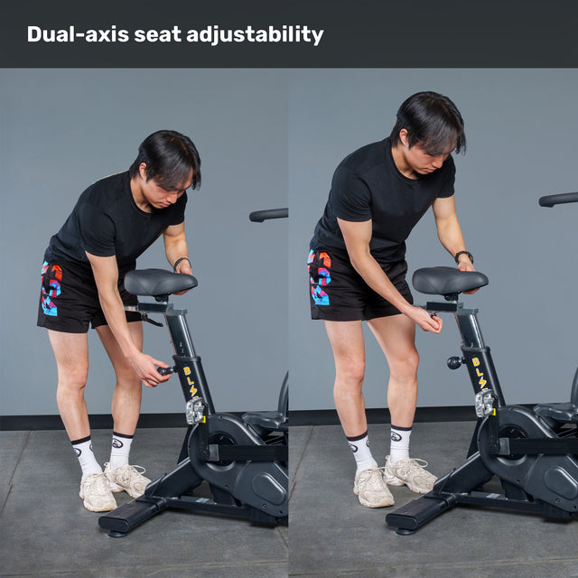 A user adjusts the seat height and position on the Bells of Steel Blitz Air Bike, showcasing its dual-axis seat adjustability. The text "Dual-axis seat adjustability" appears above, making it ideal for any home gym setup.