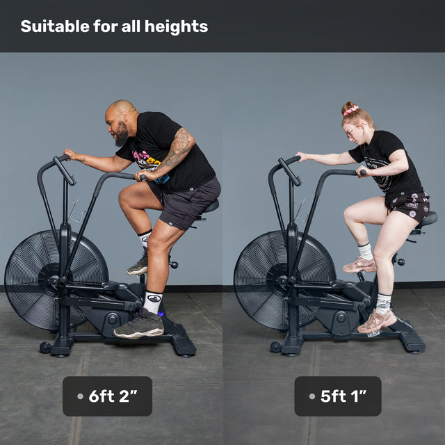 Two people, one 6'2" and one 5'1", use the Bells of Steel Blitz Air Bike, showing this belt drive air bike suits users of all heights and is perfect for any home gym.