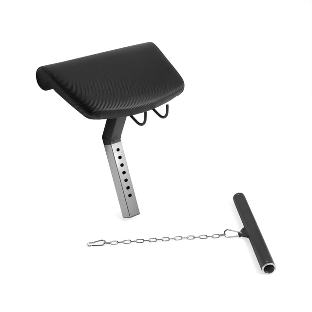 The Bells of Steel Legacy Leg Extension / Hamstring Curl Machine - Plate Loaded is shown with a metal rod and chain on a white background, featuring a black padded bench and adjustable metal arm, perfect for any home gym setup.