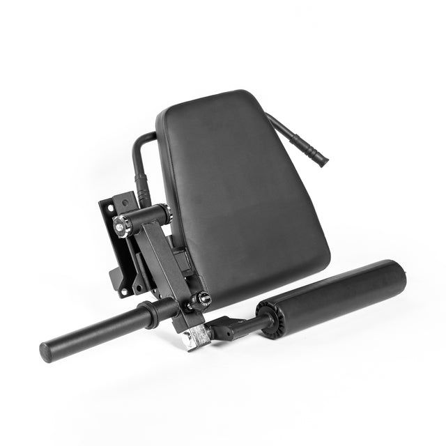 The Bells of Steel Leg Curl / Leg Extension Rack Attachment in black features a padded backrest, cylindrical leg support, metal bars, and adjustment levers—ideal for enhancing your home gym power rack, shown here on a white background.