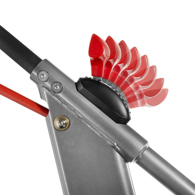 Close-up of the Bells of Steel Sisyphean Stepper’s metal lever mechanism with a black adjustment dial and red indicator, displaying multiple resistance levels on its gray frame—a key feature of this manual stair climber.