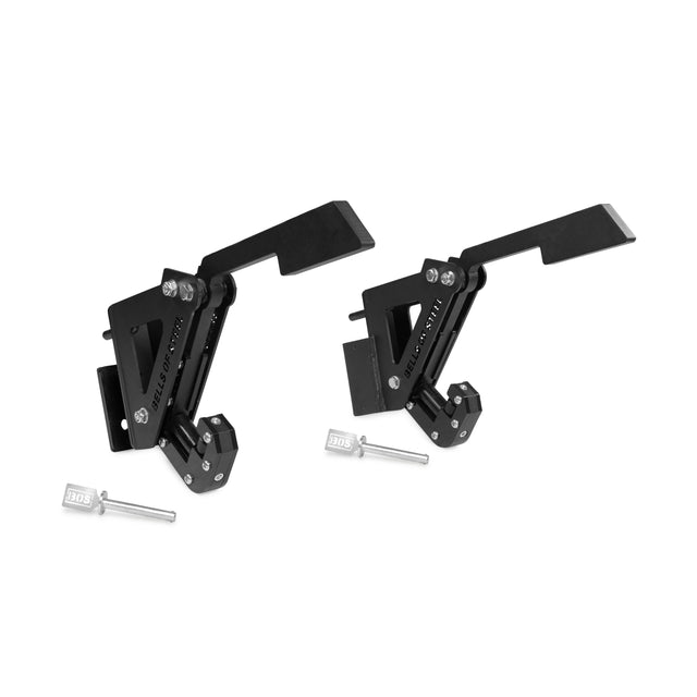 The Bells of Steel Monolift Rack Attachment features two black metal locking brackets with adjustable arms and separate silver keys—an essential squat rack accessory for serious lifters.