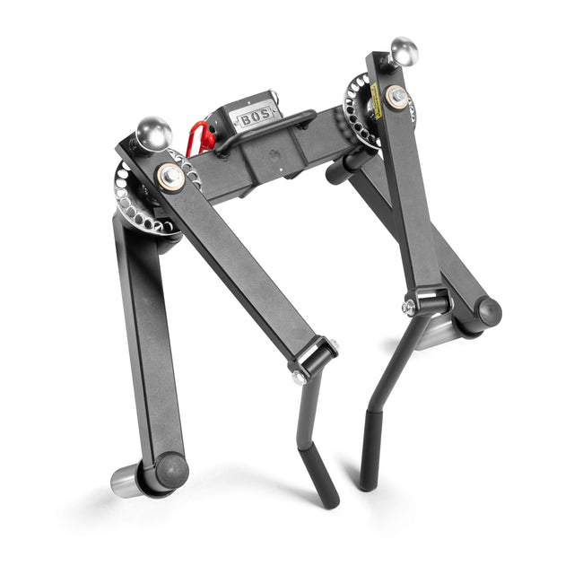 The Bells of Steel Shoulder Boulder/Chest Fly Attachment is a black mechanical device with adjustable arms and knobs, ideal for chest fly exercises to build the Shoulder Boulder look.