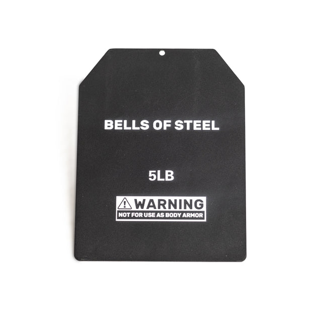 The Bells of Steel Weighted Vest and Plates features a black rectangular plate with angled top corners, labeled "BELLS OF STEEL 5LB" and a front warning, "NOT FOR USE AS BODY ARMOR," making it ideal for workout use.