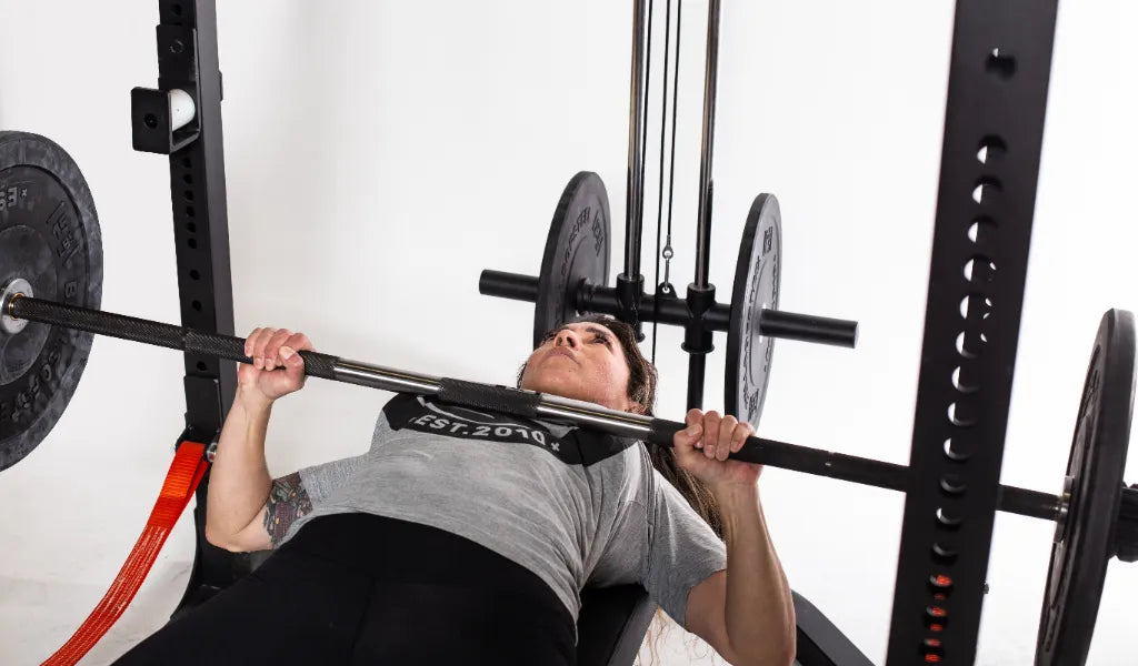 Will a stiff powerlifting bar make a difference