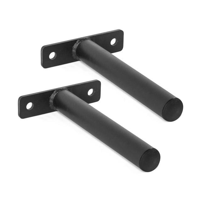 The Bolt-On Plate Pegs from Bells of Steel consist of two black metal wall-mounted brackets with cylindrical rods and rectangular bases, each having two screw holes. These sturdy brackets are excellent for supporting shelves or accommodating Olympic-sized weight plates when used in conjunction with compatible plate pegs in your home gym setup.