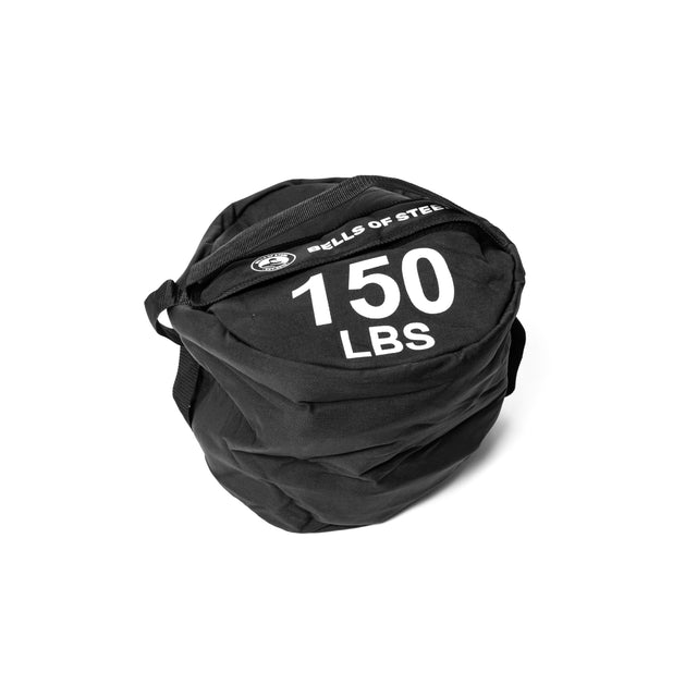 Displayed on a white background is a black Fitness Sandbag by Bells of Steel, featuring "BELLS OF STEEL" and "150 LBS" printed in white. Made from durable Condura material, it includes a top handle for convenient sandbag workouts.