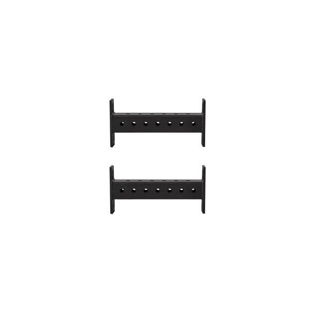 Two Hydra Crossmembers from Bells of Steel, black and rectangular in design, with multiple holes for flexible mounting. Each crossmember features two parallel sides connected by a horizontal bar, making them perfect for supporting structures or securing setups like a Hydra Rack.