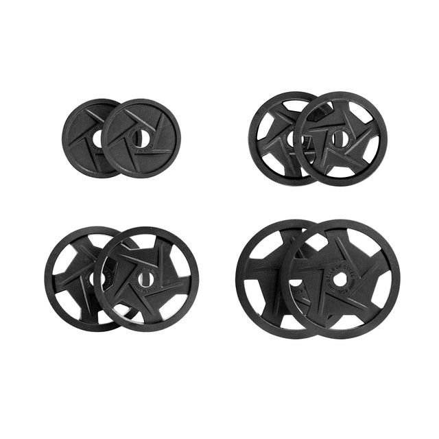 Four sets of Black Mighty Grip Olympic Weight Plates by Bells of Steel are arranged against a white background. Each set, designed for ergonomic use and featuring precision grip handles, comes in different sizes with two plates per set. The plates have central holes for attaching to a barbell.