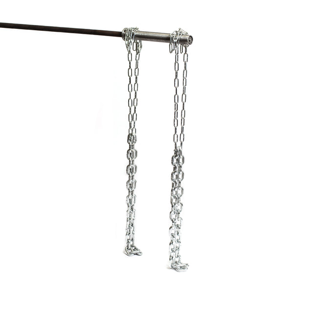 A pair of Bells of Steel Weightlifting Chains hangs from a long rod against a white backdrop, arranged to resemble swings.