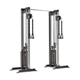 The Bells of Steel Cable Tower Squat Stands, featuring dual adjustable weight stacks, pulleys, and handles, are perfect for home gyms. Designed for strength training with a steel frame and adjustable height settings to accommodate diverse workouts.