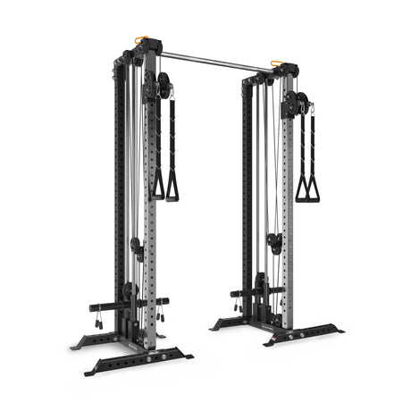 The Bells of Steel Cable Tower Squat Stands feature dual adjustable cable towers with two weight stacks, pulleys, handles, and a pull-up bar—ideal for strength training and functional workouts in any gym setting.