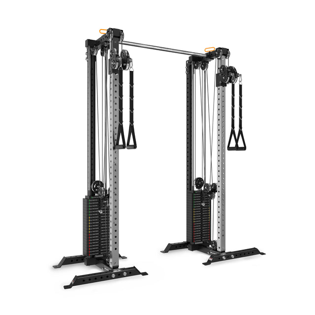 The Bells of Steel Cable Tower Squat Stands feature two weight stacks, adjustable pulleys, handles, and a connecting upper bar—perfect for versatile strength training in any home gym.