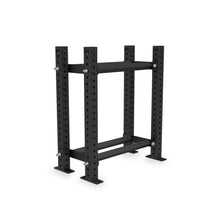 The Bells of Steel Prebuilt Bumper Plate Storage features a black metal frame with multiple holes for adjustable attachments and an integrated weight plate rack, displayed on a white background.