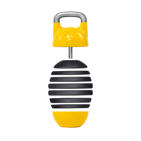 The Bells of Steel Adjustable Competition Kettlebell is a cylindrical, egg-shaped percussion instrument with alternating black and yellow stripes, a yellow handle for handheld use, and a small emblem on top, enhancing its unique design.