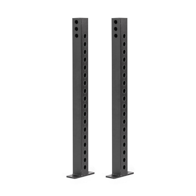 The black metal posts resemble Hydra & Manticore racks, each with multiple evenly spaced holes and flat bases for stability. They stand against a white background, compatible with Bells of Steel Folding Rack Wall Connectors & Hinges.