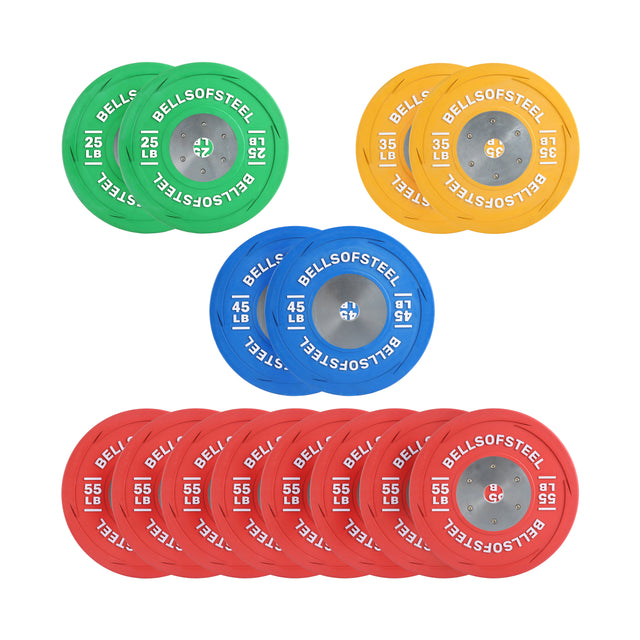 A set of vibrant LB Competition Bumper Plates by Bells of Steel is organized in a triangular pattern. The top row includes 25 lb green plates, the middle row showcases yellow 35 lb and blue 45 lb plates, while the bottom row highlights red 55 lb plates. Each plate proudly bears the "Bells of Steel" label.