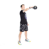 Donning a black T-shirt and Bells of Steel Gym Shorts, a person demonstrates a kettlebell swing, lifting the weight to shoulder height on a plain white backdrop. The high-performance polyester material in the shorts enhances their every move.