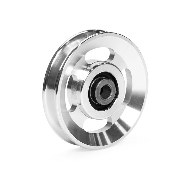 Bells of Steel's Aluminum Pulley Wheel features a sleek, shiny metallic surface with three circular cutouts and a central mechanism. Displayed on a white background, it resembles machinery components.