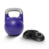 The Bells of Steel Adjustable Competition Kettlebell, featuring a purple body and silver handle, sits beside three black interchangeable weight plates on a white background—ideal for effective kettlebell training.