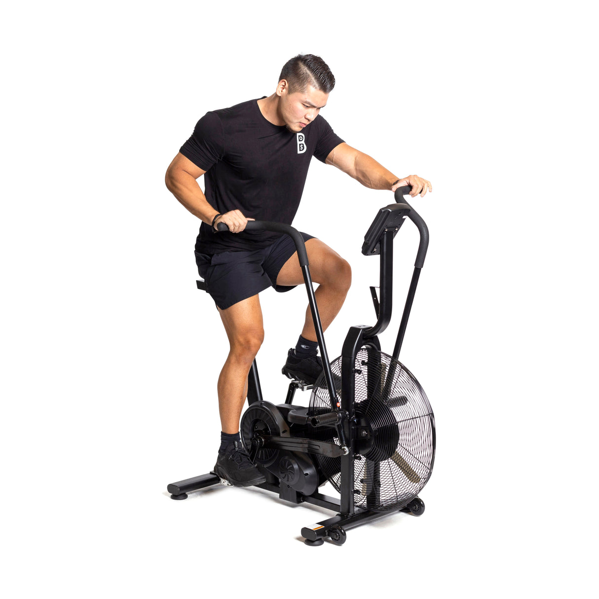 Male athlete with the Residential Air BIke: Side profile of a space-saving exercise bike with ergonomic design