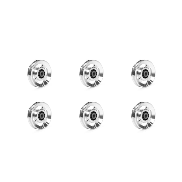 Six identical aluminum pulley wheels from Bells of Steel are arranged in two rows on a pristine white background.