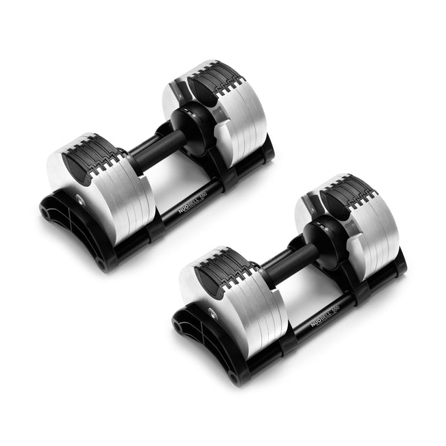 Nuobell's NÜOBELL Adjustable Dumbbells feature patent-pending black handles and shiny machined steel weight plates, showcased on a white background.