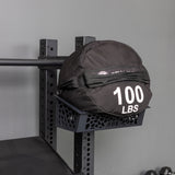 Product picture of the Rack Attached Storage Basket holding a sandbag