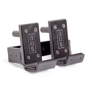 A pair of Standard J-Cups from Bells of Steel, featuring an adjustable black design with "BOS" engraved on the front. These holders are crafted to mount on a power rack or squat cage and come equipped with UHMW protection, padding, and hooks for secure bar placement.