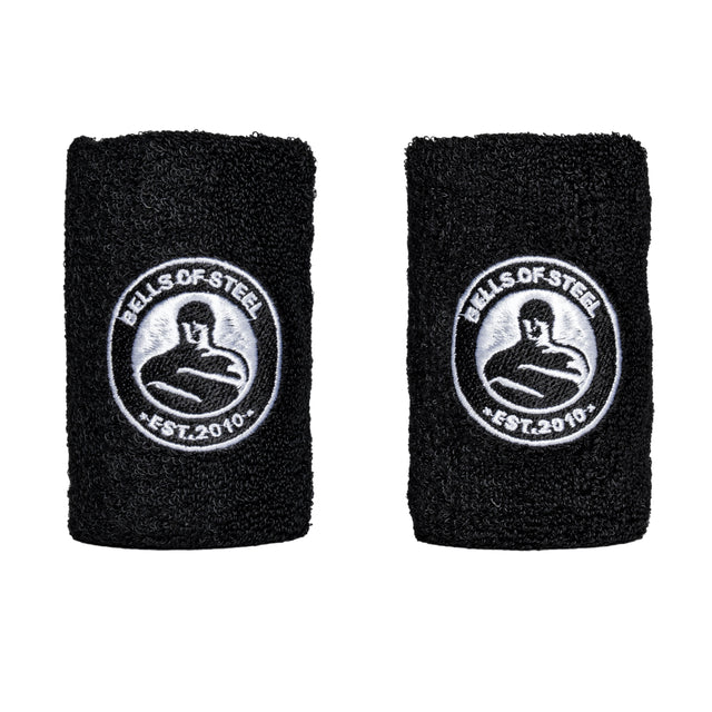 A pair of black BellGuard Kettlebell Wrist Guards from Bells of Steel, featuring a white "BELLS OF STEEL" logo with a stylized muscular figure and "EST. 2010." Perfect for kettlebell lifters seeking support and style.