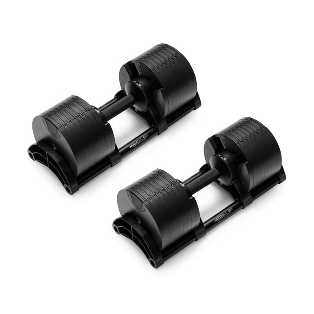 NÜOBELL Adjustable Dumbbells by Nuobell are displayed on a white background, featuring a patent-pending design. Each black dumbbell has a compact build with machined steel weight plates and a central handle for seamless weight adjustment.