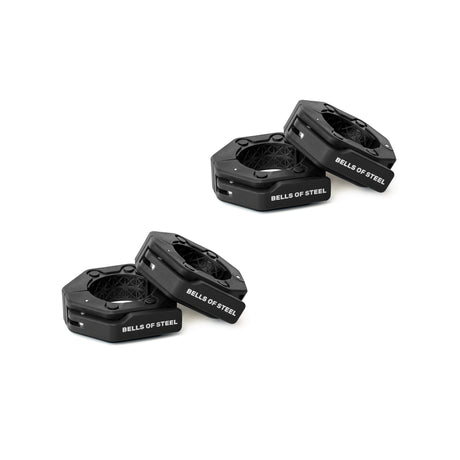 Four black Magnetic Clamp Collars by Bells of Steel, each featuring the brand’s white logo, are displayed diagonally in two pairs on a white background.