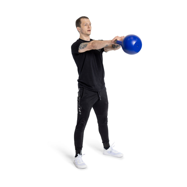 A person in black workout attire is performing a swing with a blue-set Adjustable Competition Kettlebell by Bells of Steel.