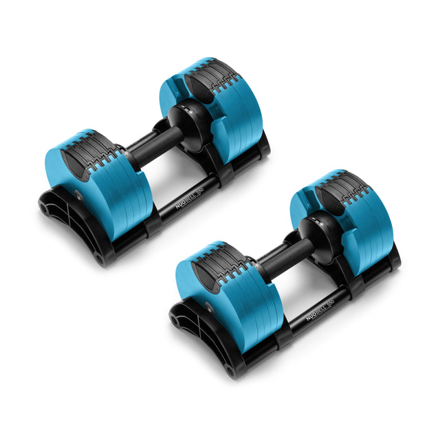 Two NÜOBELL Adjustable Dumbbells from Nuobell, featuring blue exteriors and black handles, rest on a white backdrop. The machined steel weight plates offer customizable settings, making them ideal for personalized workouts.