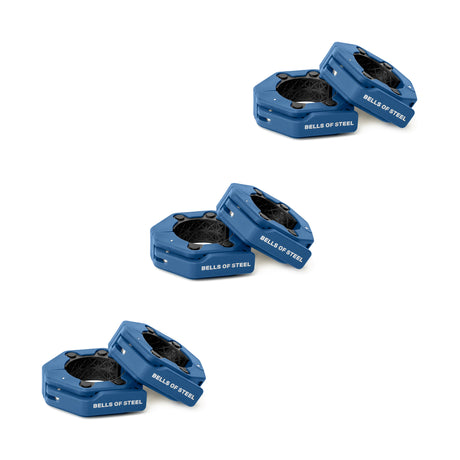 Three pairs of stacked blue hexagonal bumper plates with "BELLS OF STEEL" on the sides are arranged diagonally on a white background, ideal for use with Magnetic Clamp Collars from Bells of Steel for secure lifting sessions.