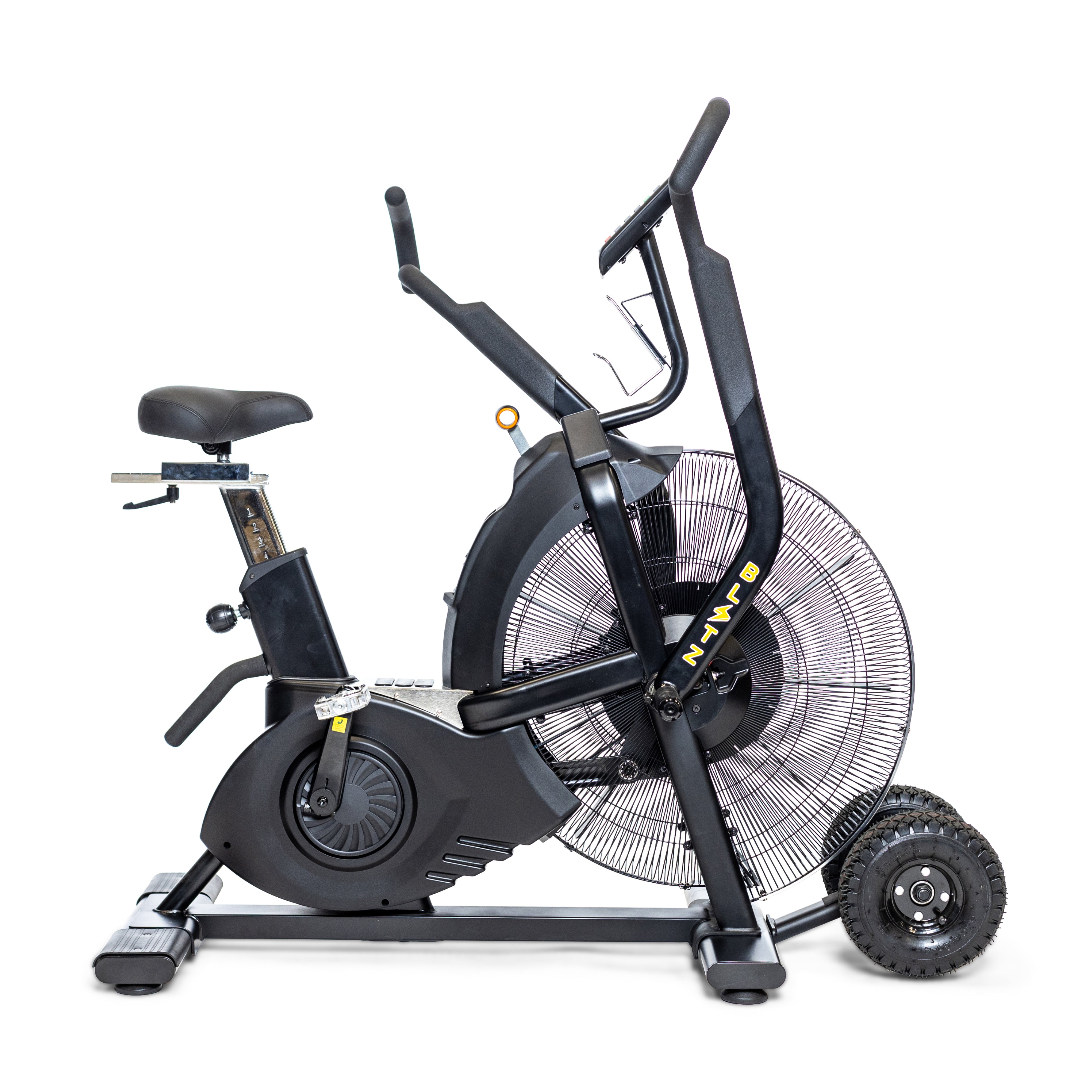 Side view of a stationary Bells of Steel Blitz Max Air Bike, showcasing its sleek black frame and large fan wheel. This bike comes with a padded seat, adjustable handlebars, and foot pegs—ideal for intense workouts in any fitness studio.