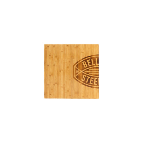 A rectangular bamboo insert, branded as the Deadlift Platform Bamboo Insert (Left) by Bells of Steel Canada, has a smooth surface and displays a dark brown emblem on the right side. This emblem features an oval football shape with the letters "BELL," while "STEEL" is partially visible. The wood boasts a natural, light finish with visible grain patterns, providing an elegant touch.