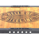 The Bells of Steel Deadlift Platform Bamboo Insert features durable wood, black metal edges with six front bolts, and a branded center. A bamboo insert provides added strength and stylish appeal.