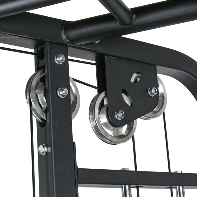 Close-up of Bells of Steel Functional Trainer in black metal, showcasing its sturdy frame, pulleys, and cables designed for cable machine exercises with highlights on the metallic wheels and mechanical details.