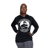 Female model standing while wearing Bos Classic hoodie and holding both her waist.
