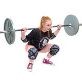 Female athlete doing weight lifting with Classic Knee Sleeves