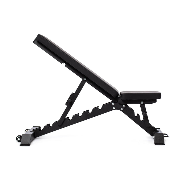 The Buzz-Saw Heavy-Duty Adjustable Bench by Bells of Steel is shown from a side view with its black padded seat and backrest set to an incline. This sturdy bench has a metal frame and adjustment slots for various angles, making it ideal for any exercise routine.