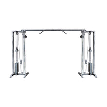 The Bells of Steel Cable Crossover Machine features dual adjustable pulleys and handles, dual weight stacks, a pull-up bar, and a sturdy steel frame—ideal for diverse cable exercises and strength training.