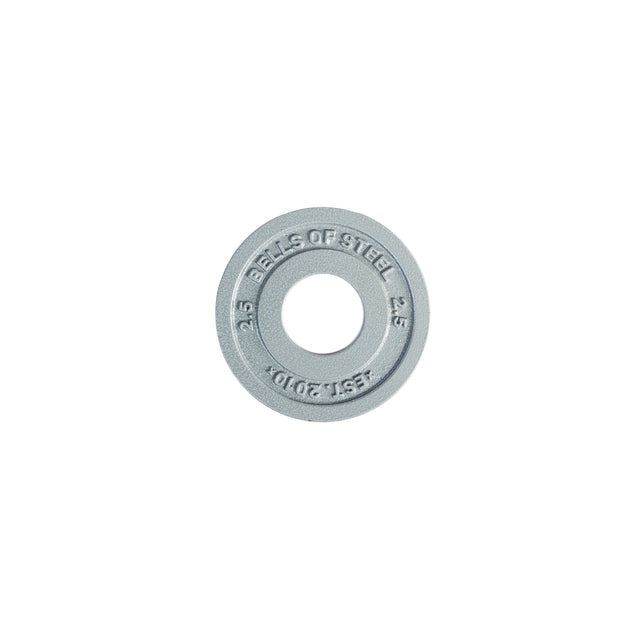 The machined iron Olympic weight plate from Bells of Steel features a round design with "BELLS OF STEEL," "2.5," and "EST. 2010" engraved on it. It boasts a precision hole for gym equipment and is shown in silver-grey, isolated on a white background.