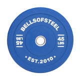 The blue Coloured Bumper Plate by Bells of Steel features white "45 LBS" and "Est. 2010" text, complete with a durable stainless steel insert ring for accurate weight measurement, making it an essential addition to any collection.