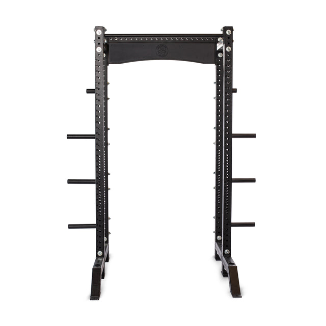 The Bells of Steel Hydra Collegiate Power Rack Builder (3" x 3", ⅝" Holes) is a black metal power rack with modular components, featuring multiple adjustable holes and safety bars for weightlifting. It includes side pegs for weight plate storage, has a sturdy base for stability, and can be enhanced with Hydra Lat Pulldown attachments.