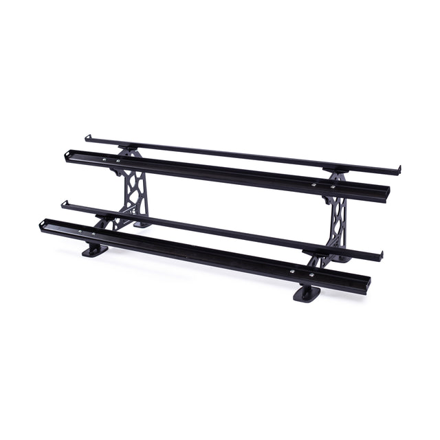 The Commercial Interchangeable Weight Rack by Bells of Steel features a black metal shelving frame with three tiers, lattice-patterned sides, and foot mounts for stability, ideal for customizable storage of urethane dumbbells or competition kettlebells.