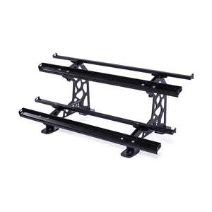 The Bells of Steel Commercial Interchangeable Weight Rack - Components Only features a robust black metal frame with three parallel bars, ideal for mounting on a vehicle. It is equipped with adjustable brackets for secure attachment. With its modular storage shelf design, it caters to diverse requirements, all set against a plain white background.